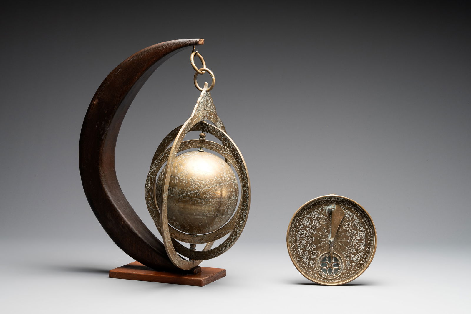 An Islamic brass astrolabe and a Persian sundial with compass, 19th C. (1 of 8)