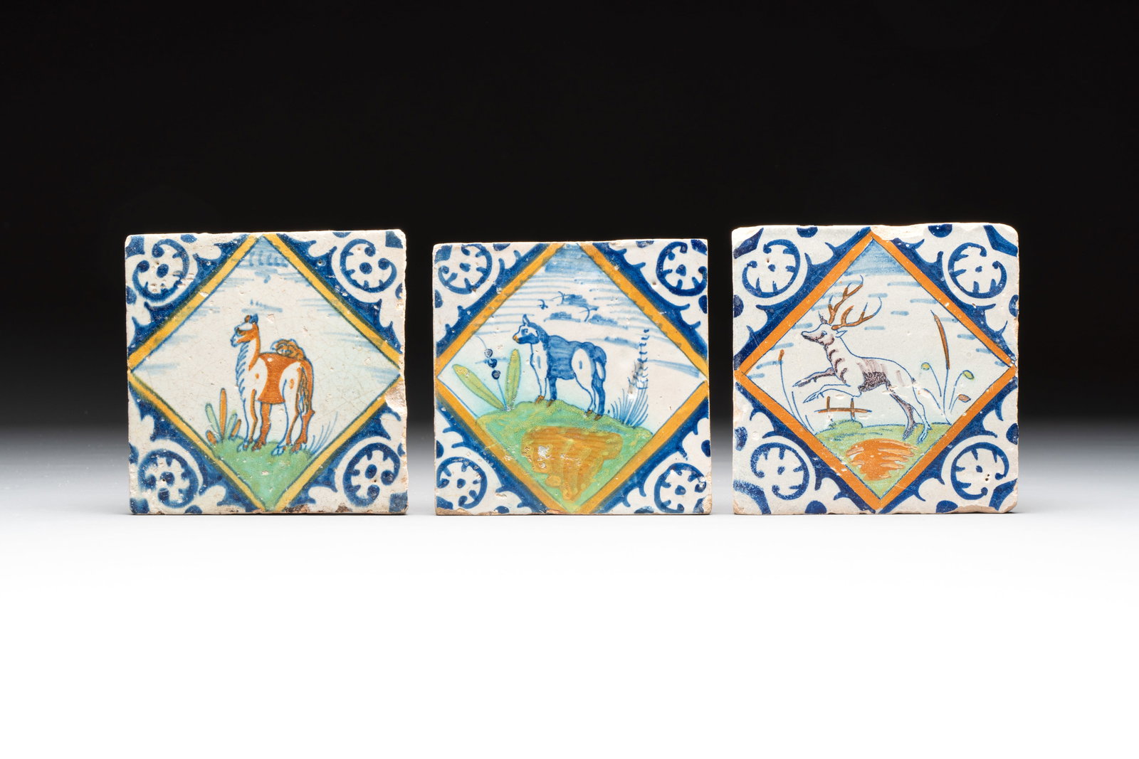 Three polychrome Dutch Delft 'animal' diamond tiles, 17th C. (1 of 2)