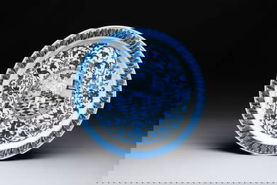 A rare and large Chinese blue and white 'Bacchus' dish, Kangxi