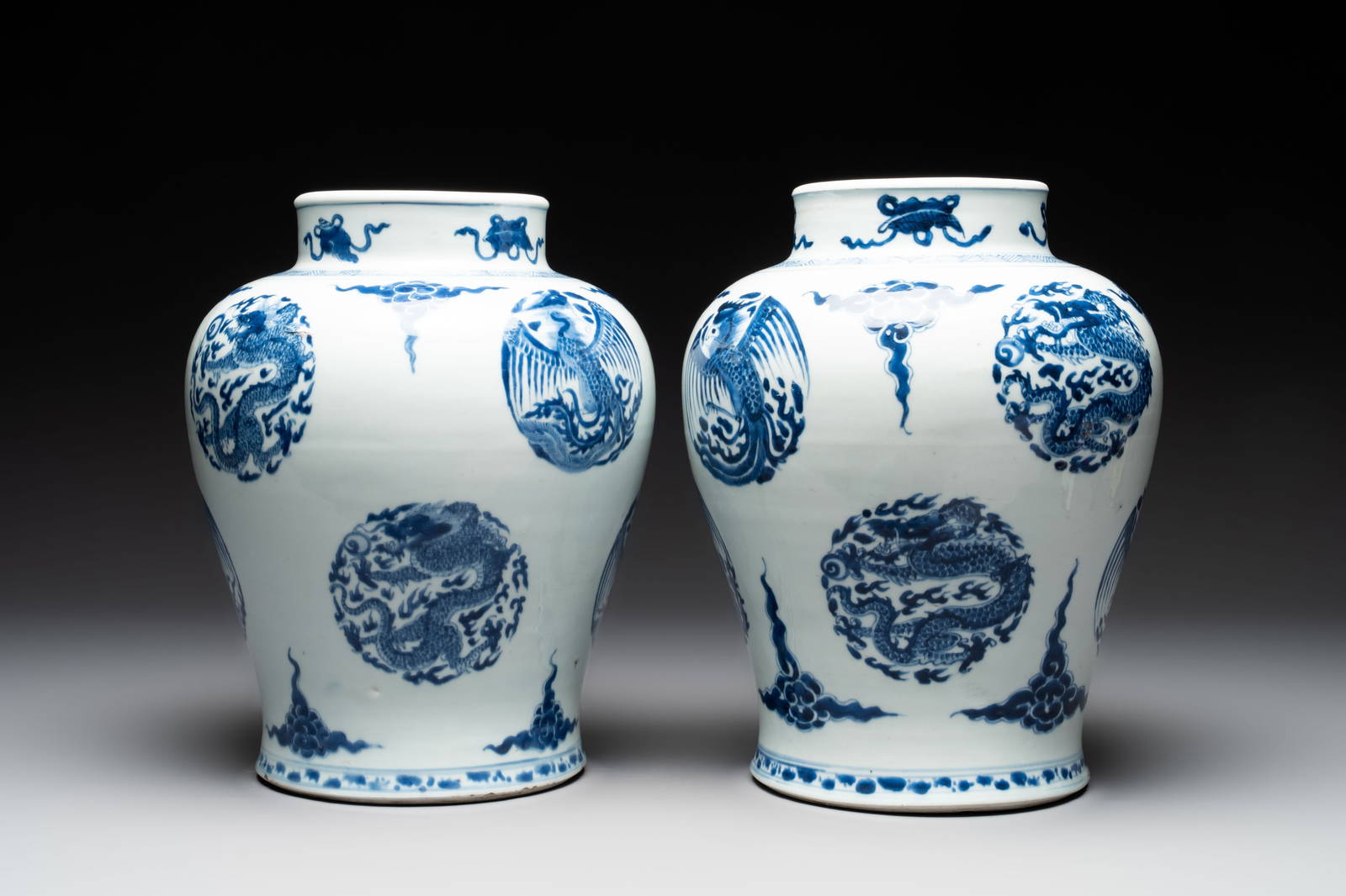 A pair of Chinese blue and white 'dragons and phoenixes' vases, Kangxi