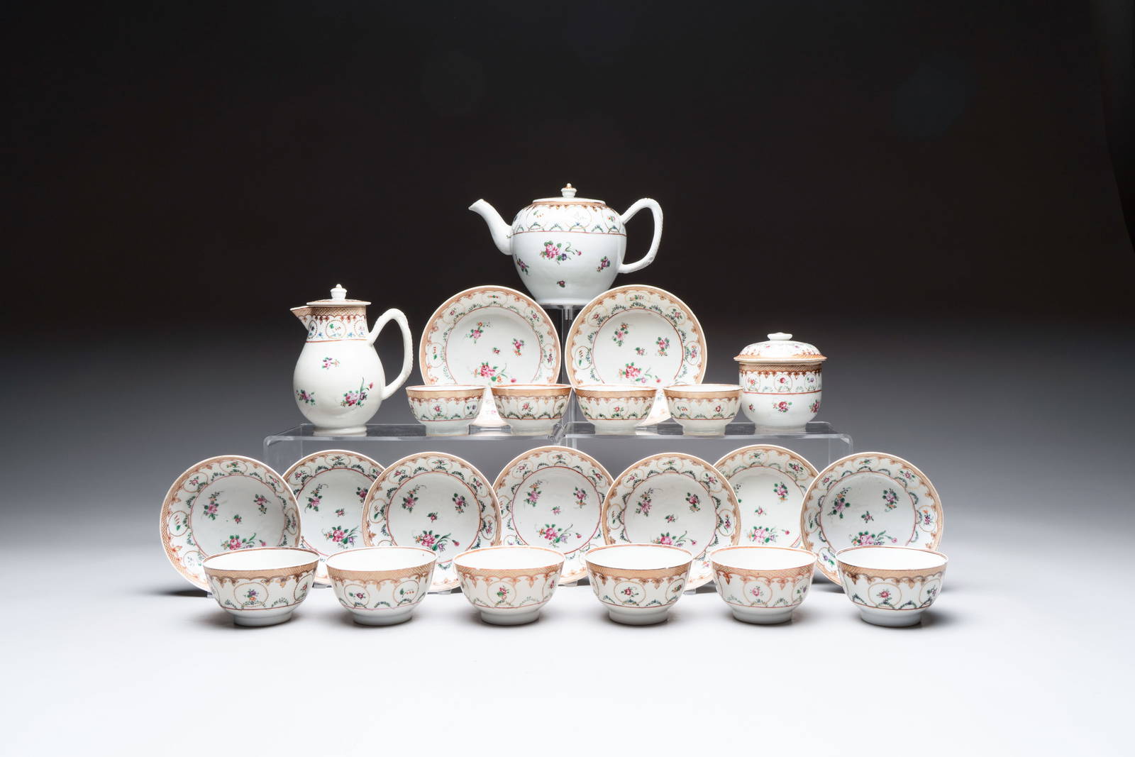 A Chinese famille rose 22-piece tea service with floral design, Qianlong