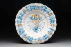 A polychrome lobed 'floral' dish, Nevers, 17th C.