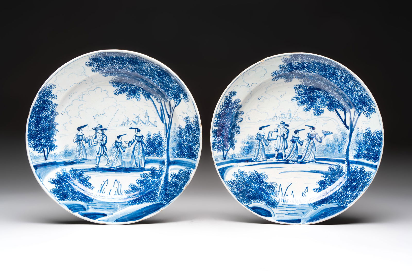 A pair of blue and white Dutch Delft dishes with a pastoral scene, 18th C. (1 of 3)