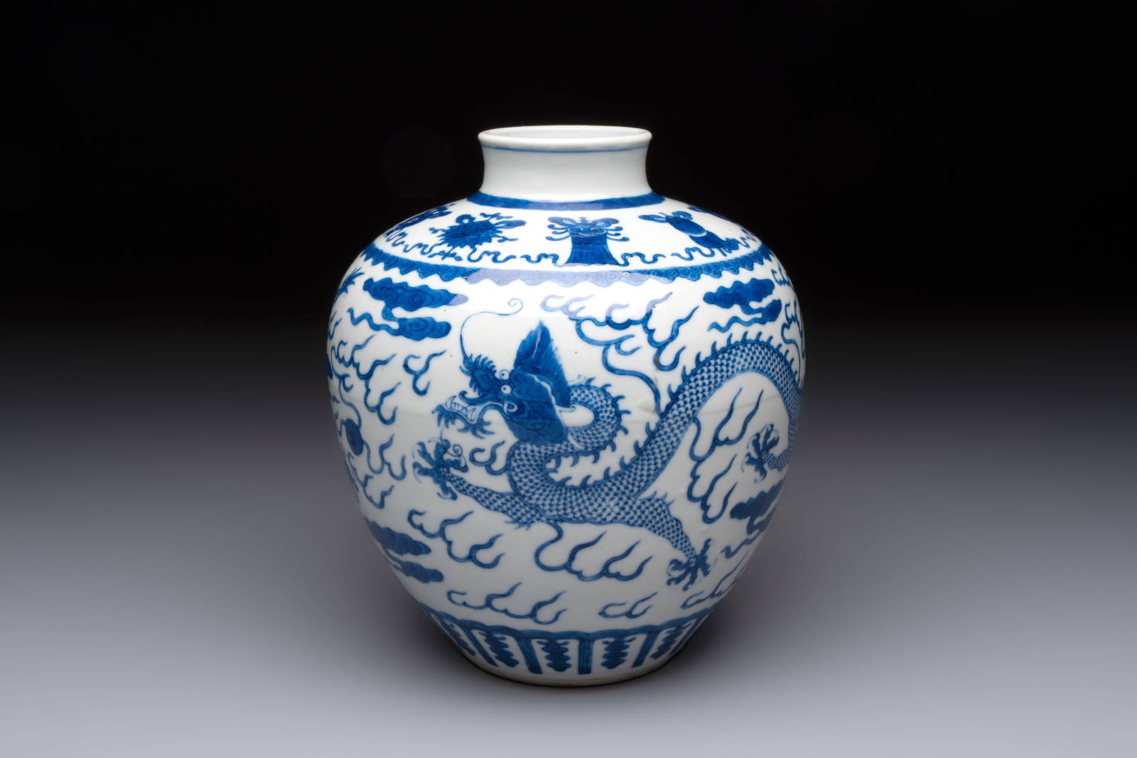 A Chinese blue and white 'dragon' vase, Kangxi mark, 19th C.