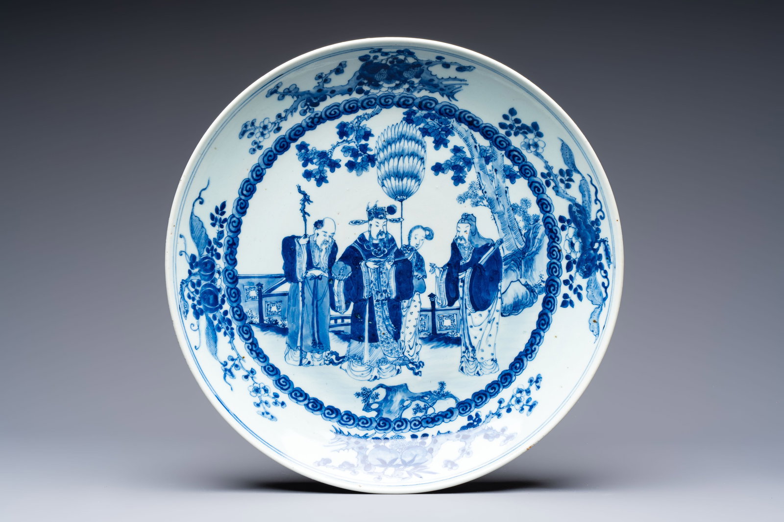 A Chinese blue and white 'Sanxing' dish, Kangxi mark, 19th C.: A Chinese blue and white 'Sanxing' dish, Kangxi mark, 19th C. Dia.: 37 cm