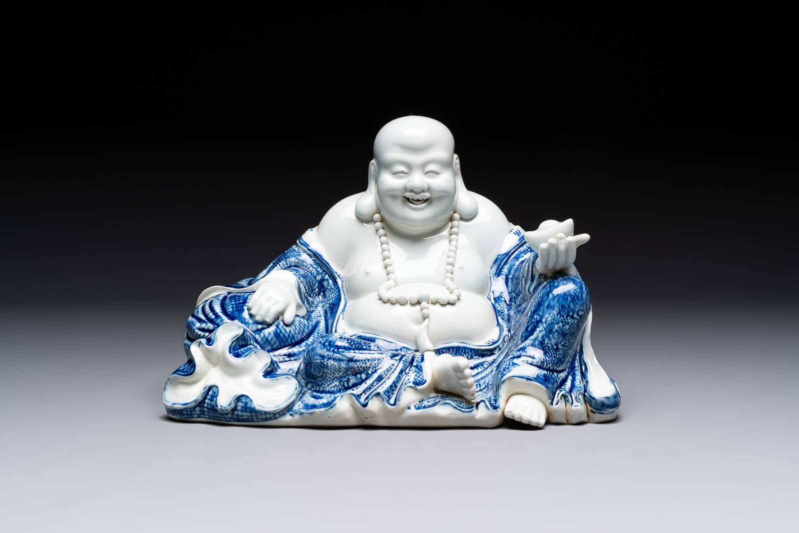 A Chinese blue and white Milefo Buddha, Zeng Long Sheng mark, 20th C.