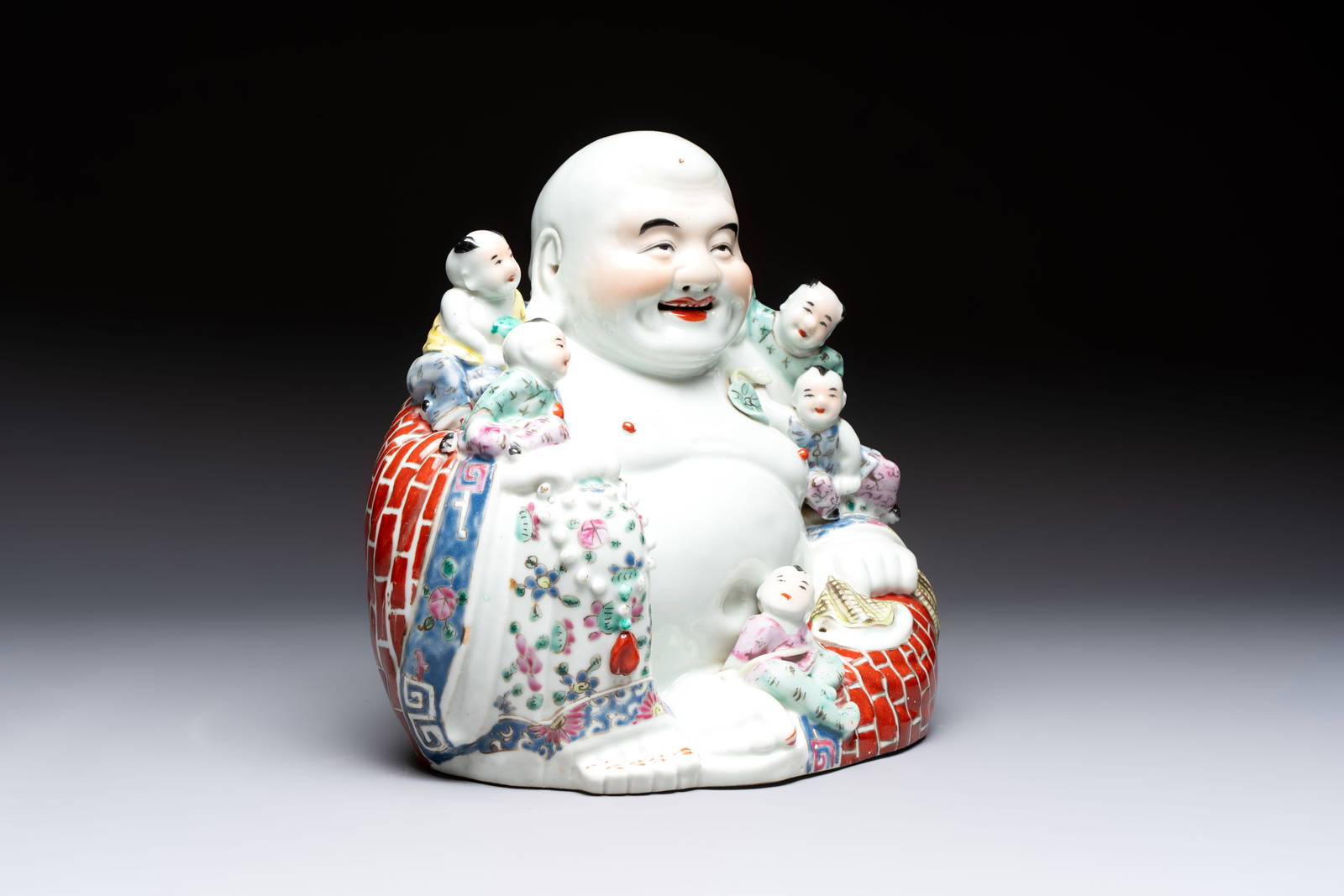 A Chinese famille rose Milefo Buddha, Mao Ji Sheng Zao mark, 20th C.