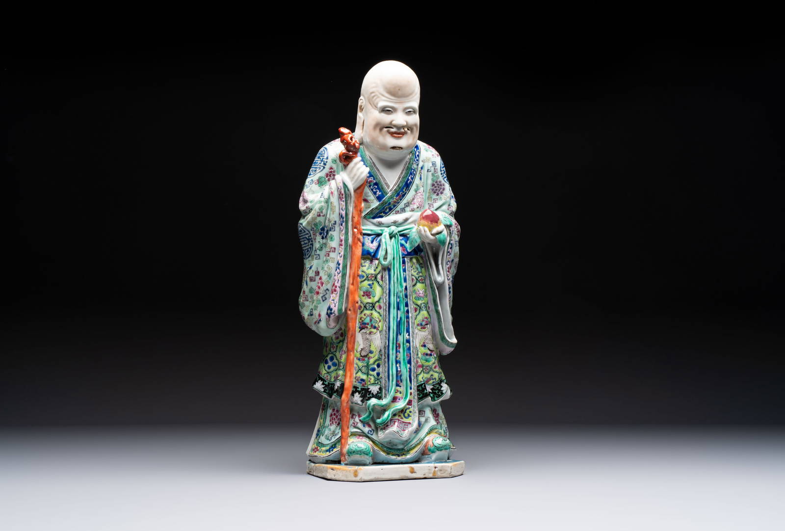 A Chinese famille rose figure of Shoulao, 19th C.