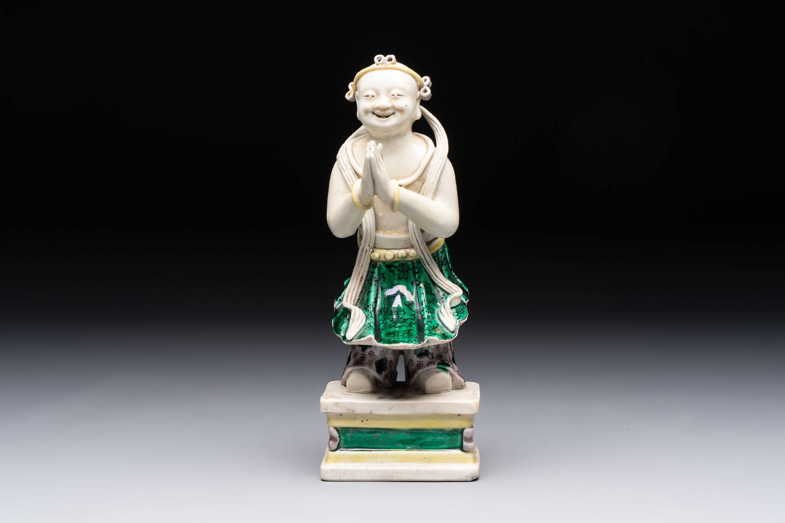 A Chinese sancai-glazed figure of Sudhana, 19th C.
