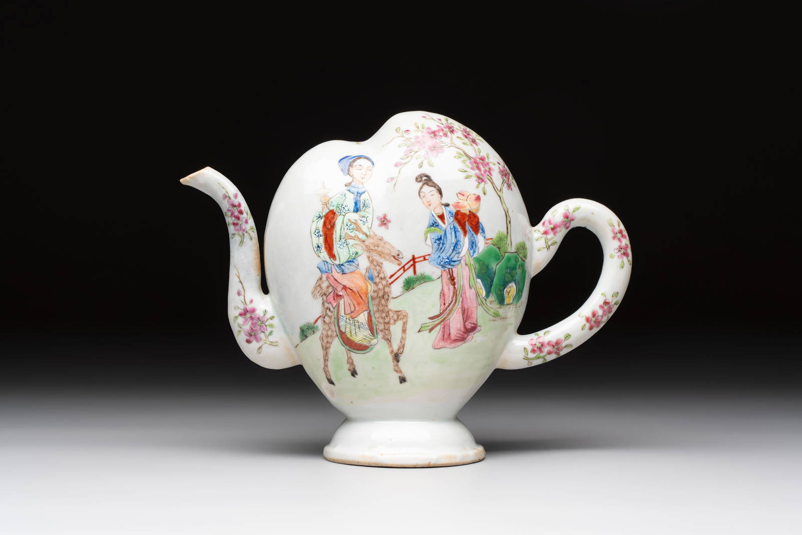A Chinese famille rose peach-shaped 'Ma Gu Xian Shou' and 'Sanxing' cadogan teapot, Jiaqing
