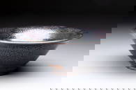 A rare Chinese black-glazed 'oil-spot' tea bowl, Song/Jin