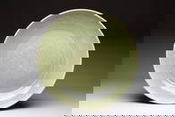 A rare and large Chinese Longquan celadon 'lotus bouquet' dish, Ming, early 15th C.