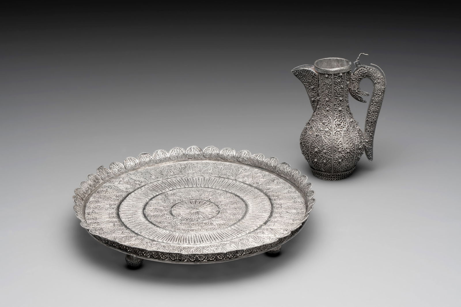 An Indo-Persian silver filigree tray and ewer, 19th C. (1 of 8)