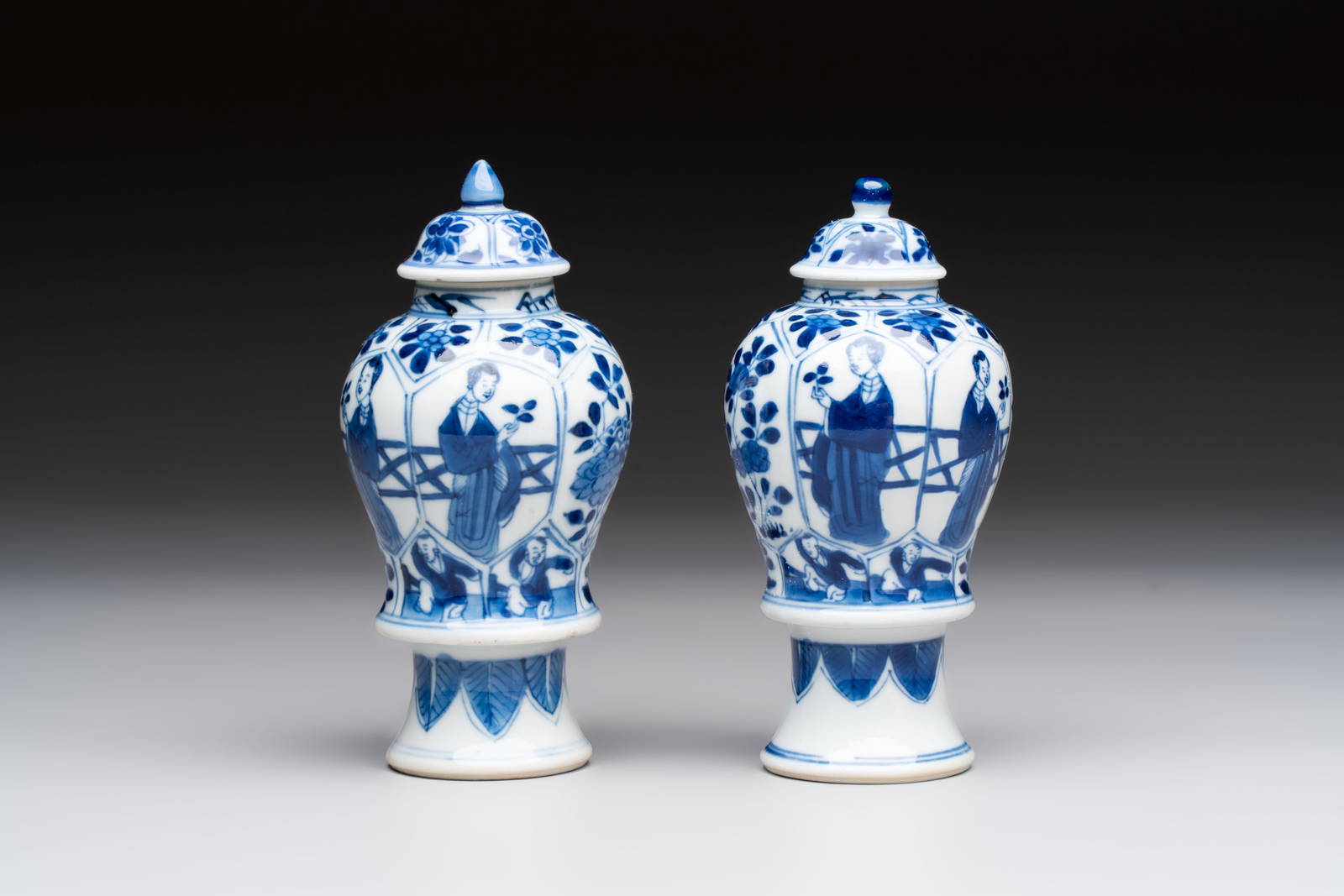 A pair of Chinese blue and white 'Long Eliza and playing boys' covered vases, Kangxi