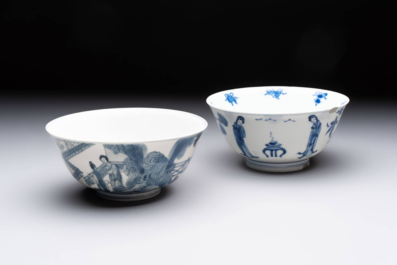 Two Chinese blue and white bowls with figural design, Chenghua and Kangxi marks, Kangxi