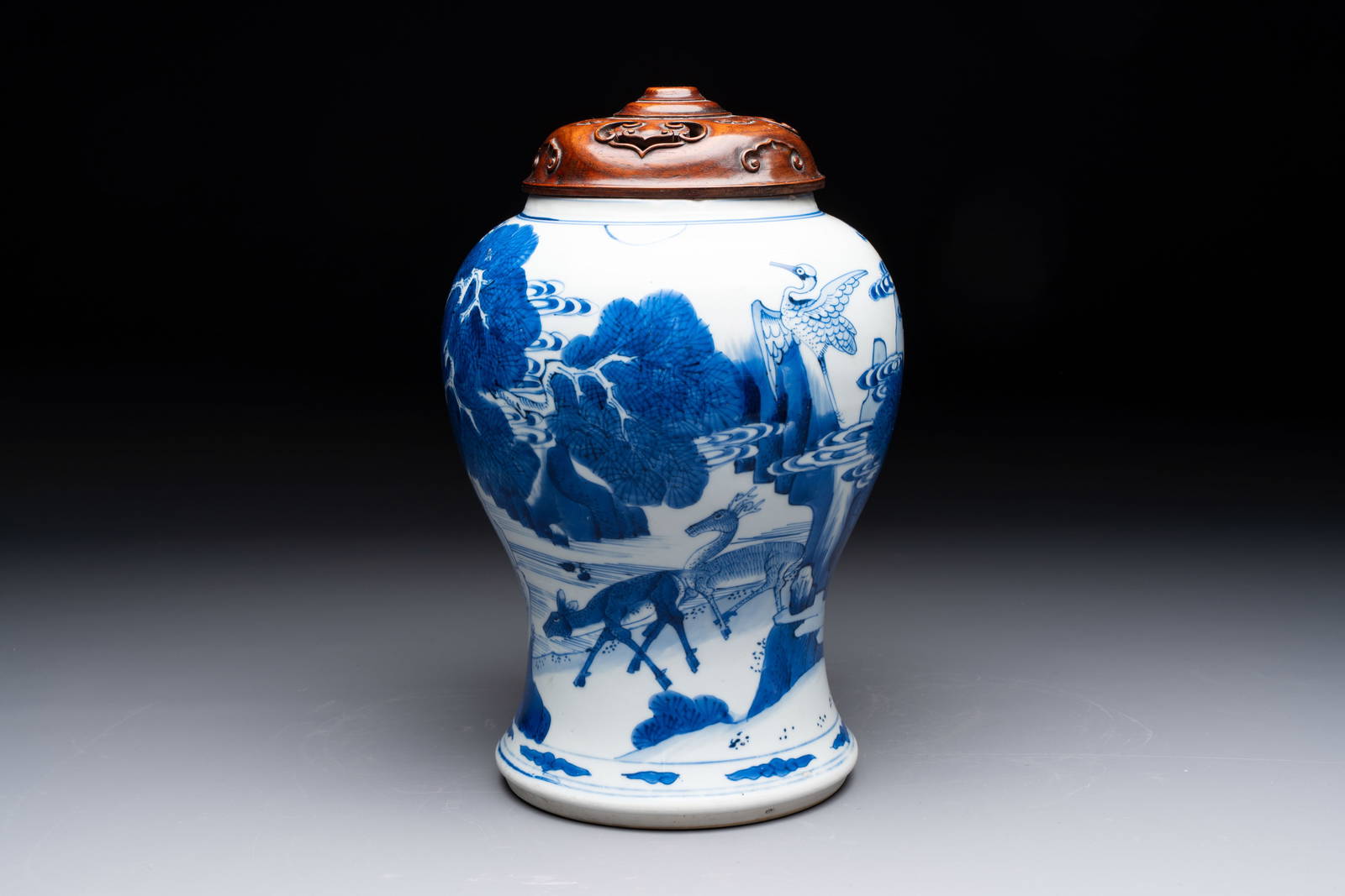 A Chinese blue and white 'He Lu Tong Chun' vase and a wooden cover, Kangxi