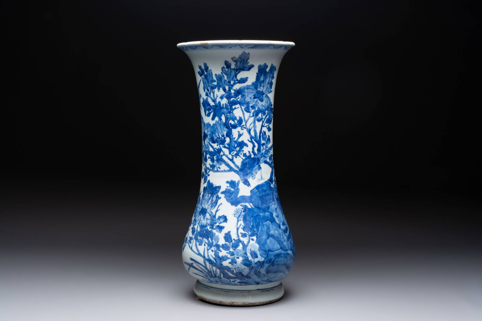 A Chinese blue and white vase with birds among flowering branches, Kangxi