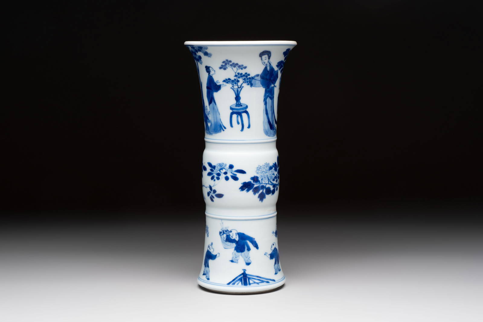 A Chinese blue and white 'Long Eliza and playing boys' 'gu' vase, Kangxi