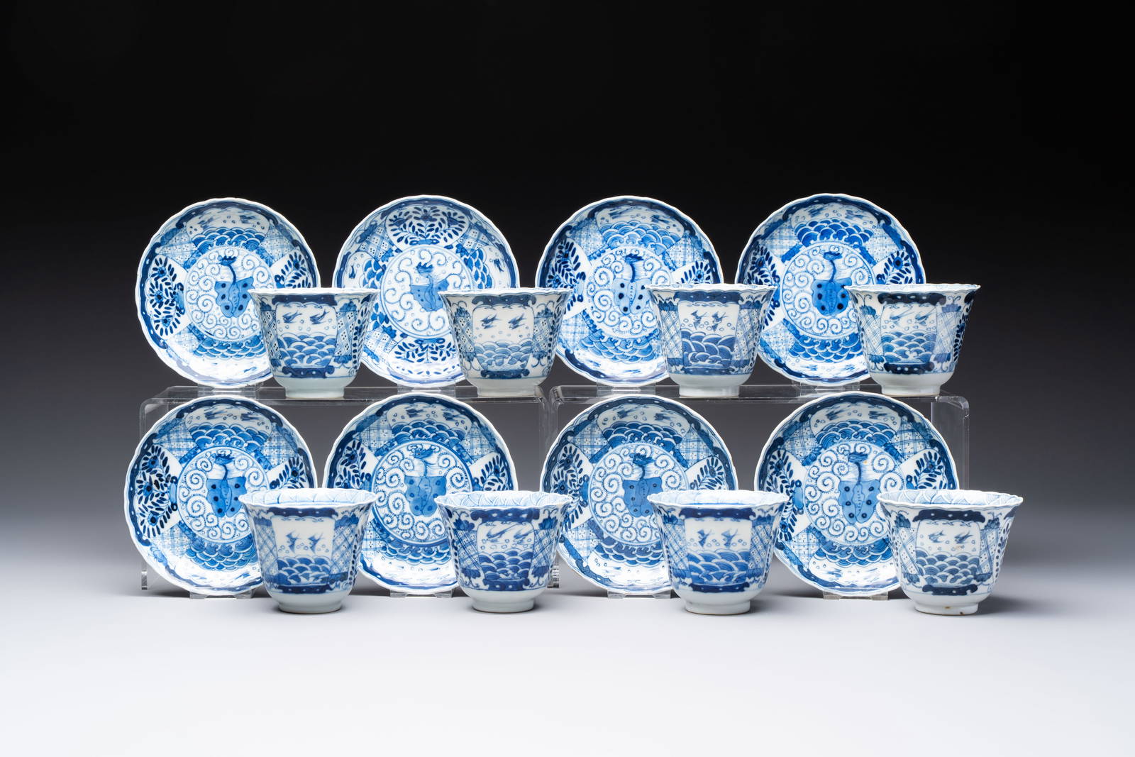 Eight Chinese blue and white cups and saucers, Kangxi mark, 19th C.
