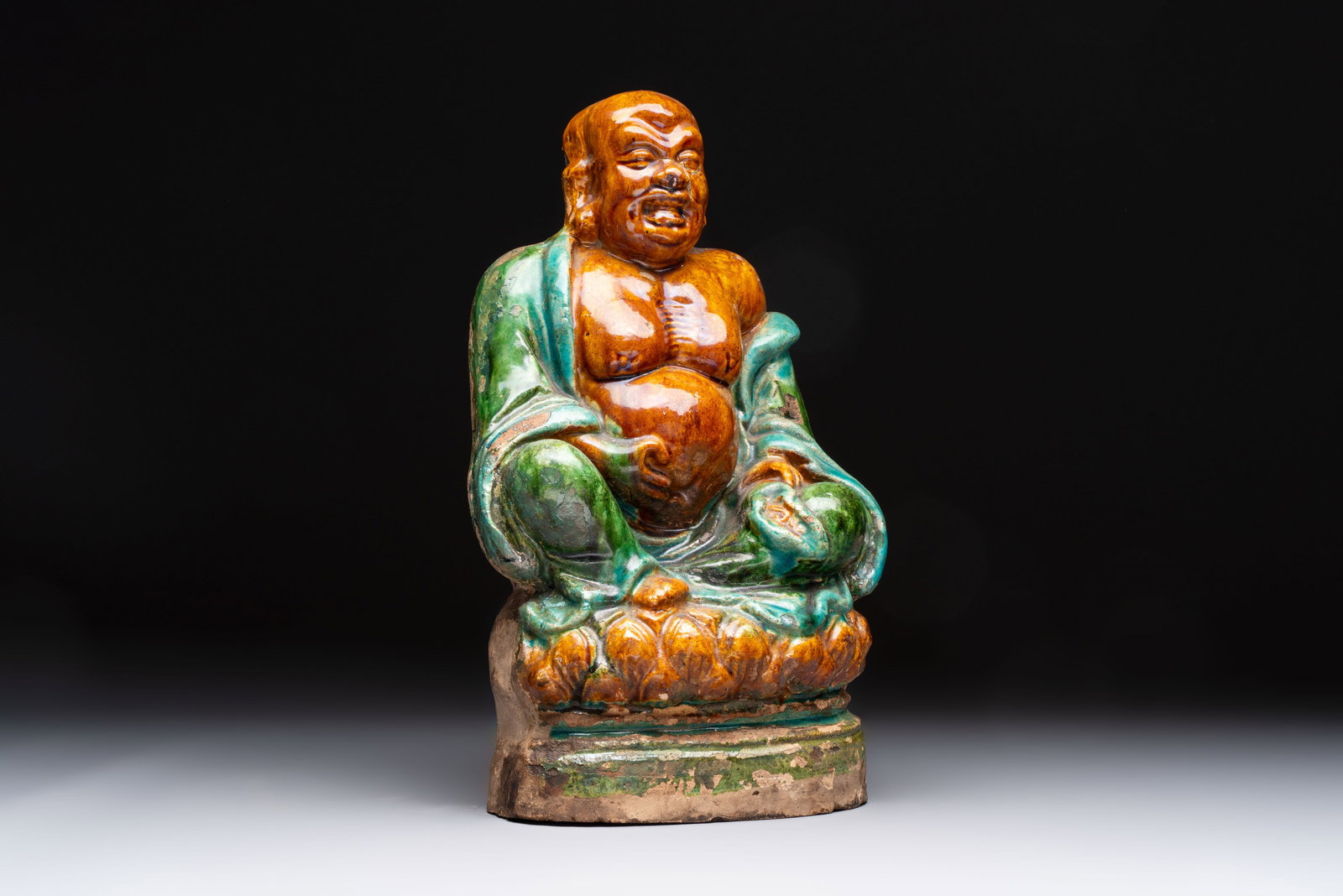 A Chinese Fahua Milefo Buddha, Ming: A Chinese Fahua Milefo Buddha, Ming H.: 29 cm