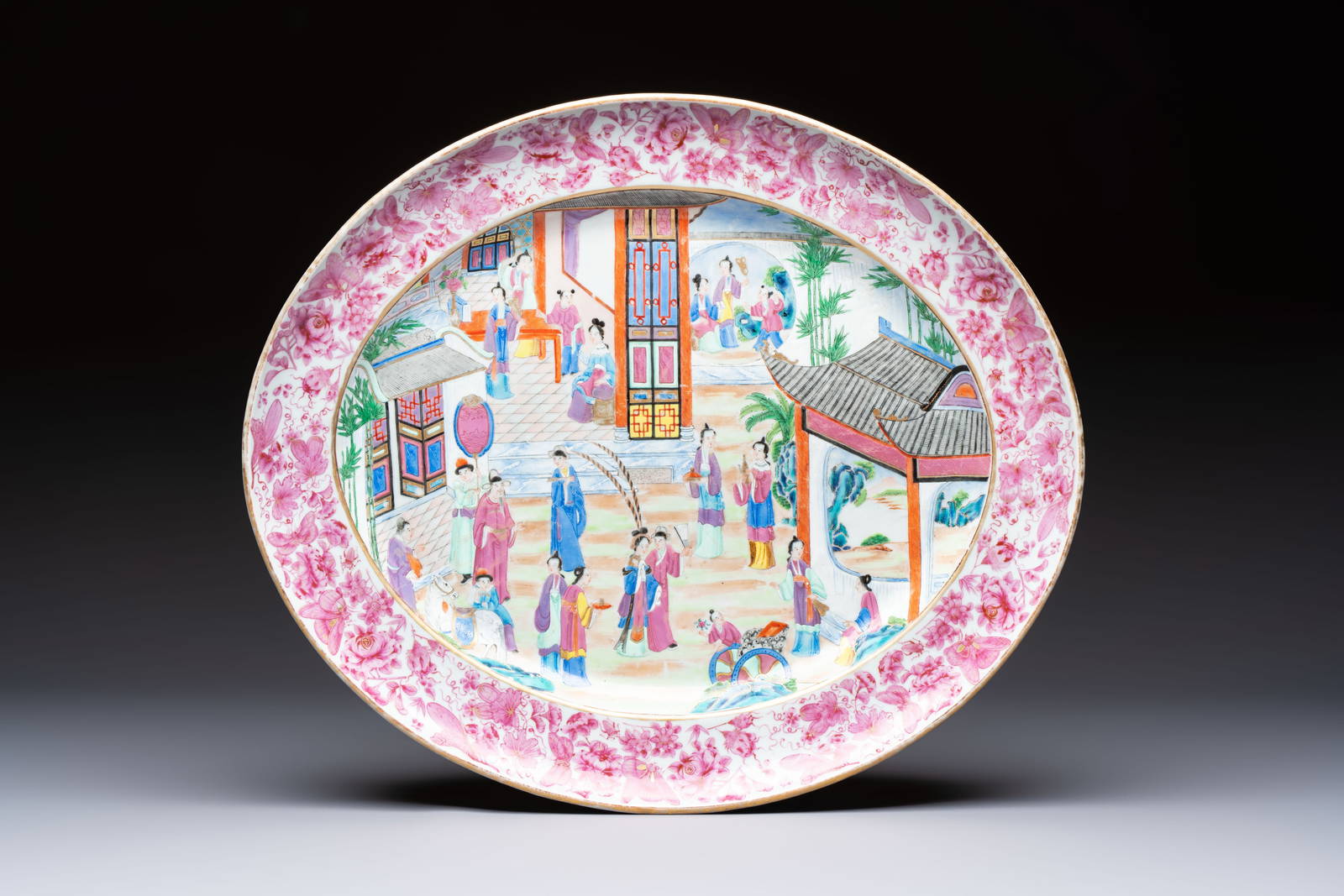 A fine large Chinese Canton famille rose dish with a palace garden scene, 19th C.