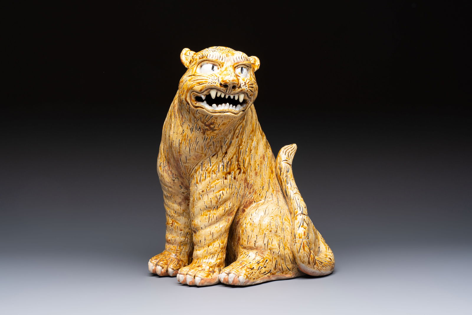 A rare Korean porcelain model of a seated tiger, Joseon, 18/19th C. (1 of 7)