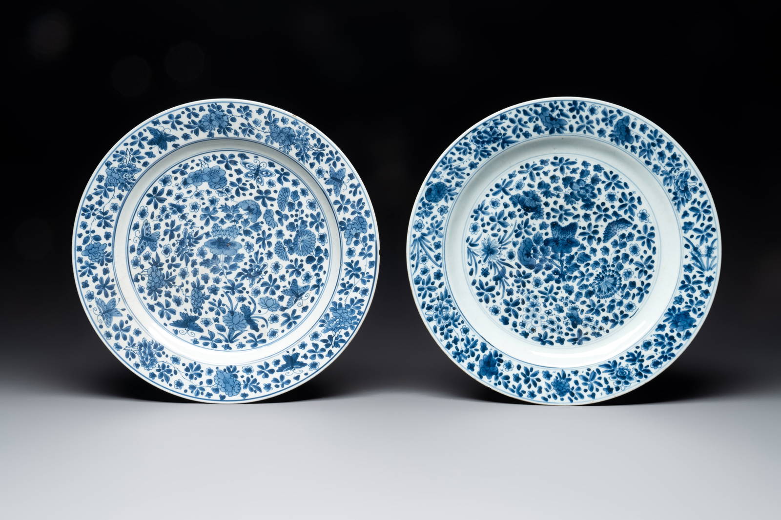 A pair of Chinese blue and white dishes with floral design, Chenghua mark, Kangxi