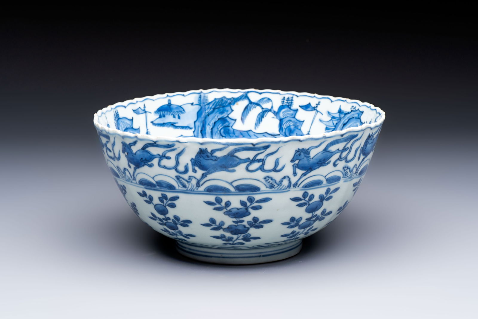 A Chinese blue and white 'Flying Horses' bowl, Fu Gui Jia Qi mark, Wanli (1 of 7)