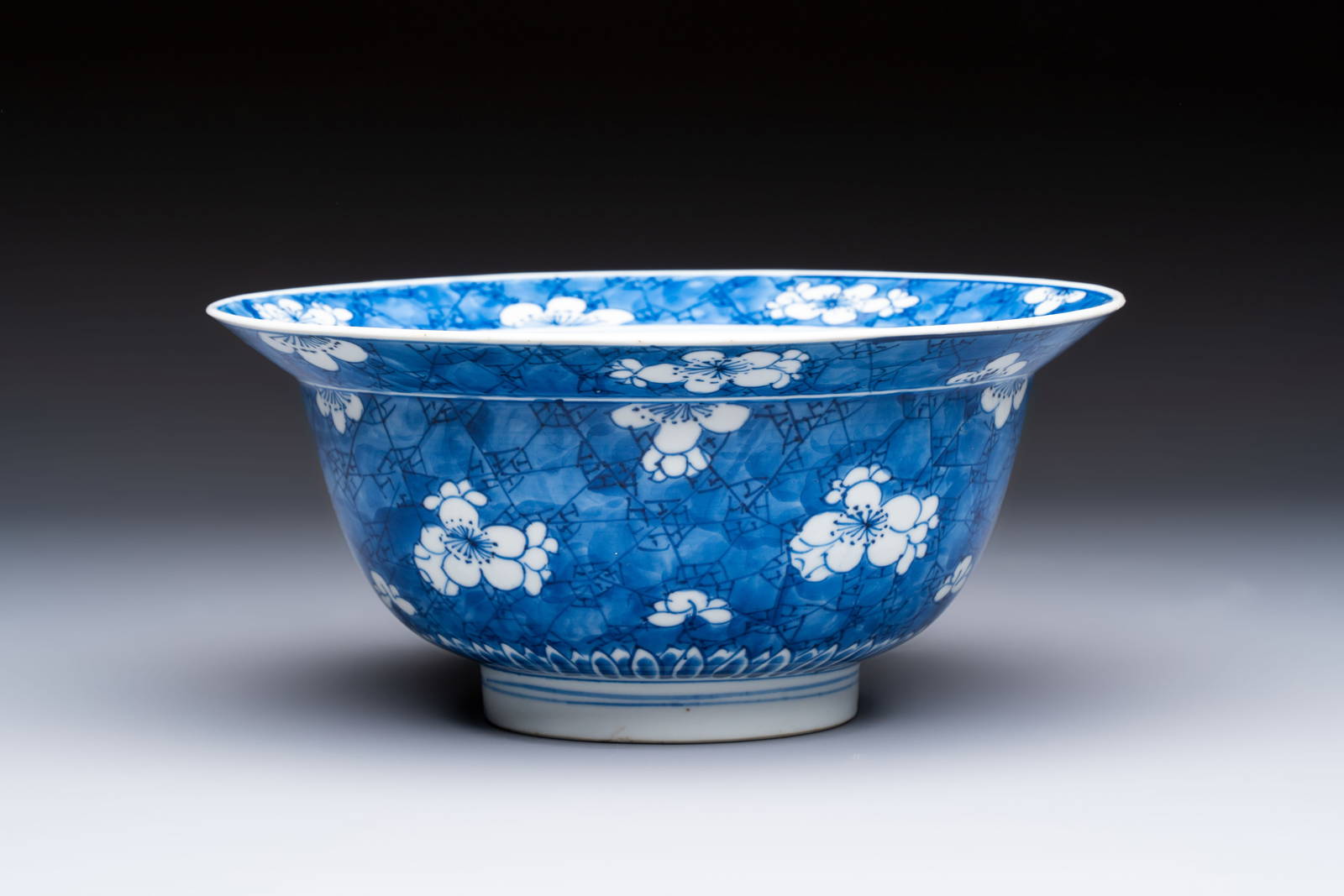 A Chinese blue and white 'Prunus on Cracked Ice' bowl, lingzhi mark, Kangxi
