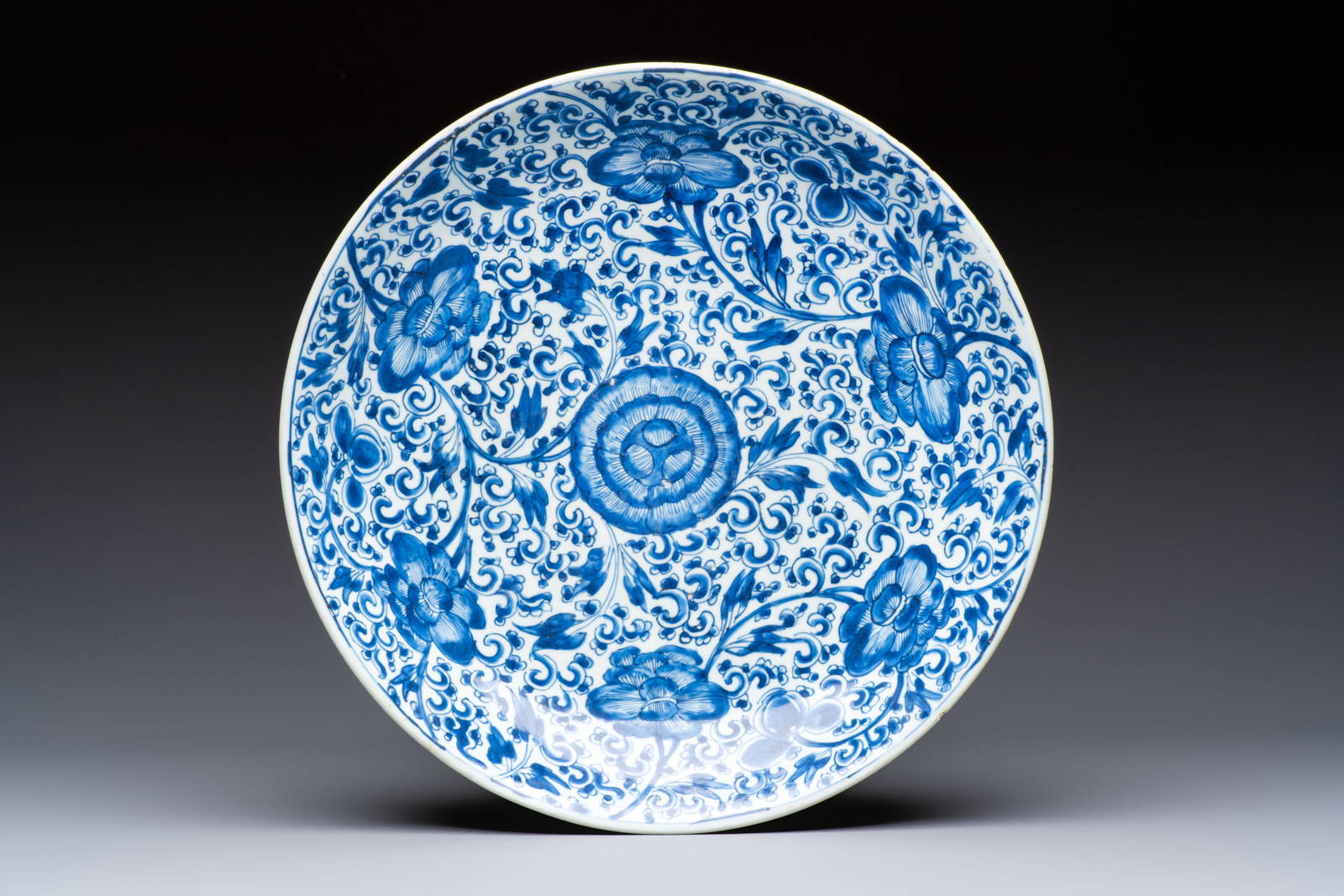 A large Chinese blue and white 'Peony Scroll' dish, artemisia leaf mark, Kangxi