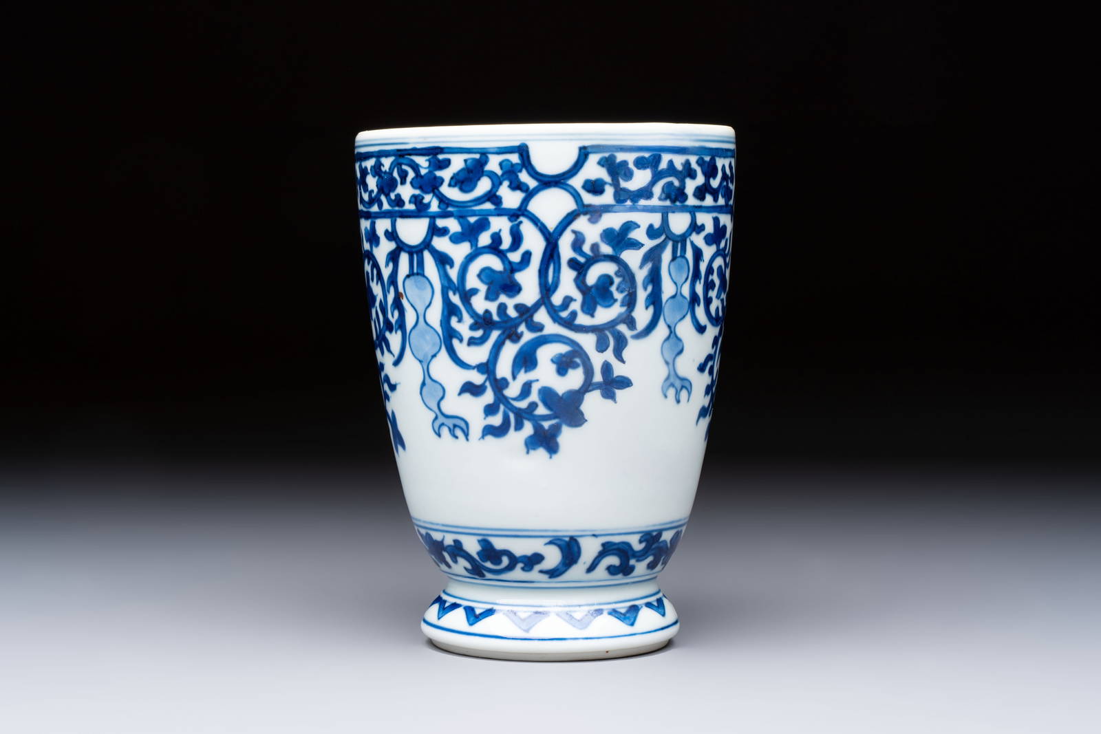 A Chinese blue and white beaker after a European silver model, lingzhi mark, Kangxi