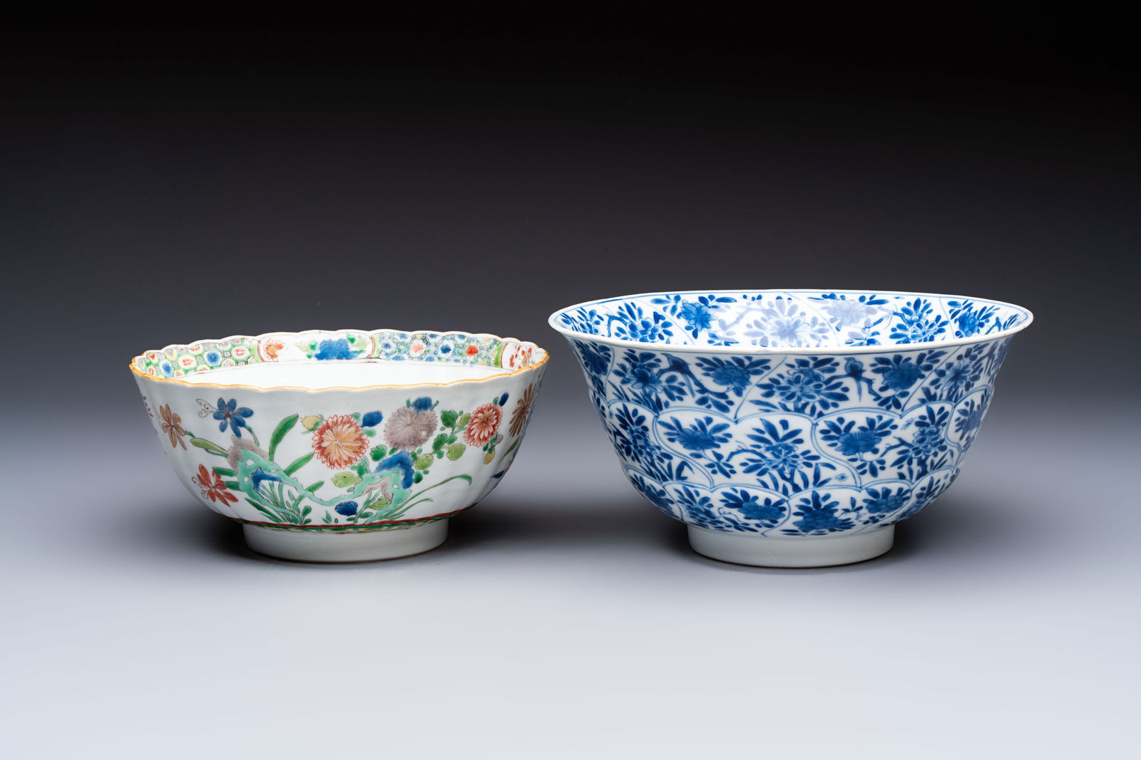 A Chinese blue and white bowl with floral design and a famille verte bowl, Kangxi (1 of 7)