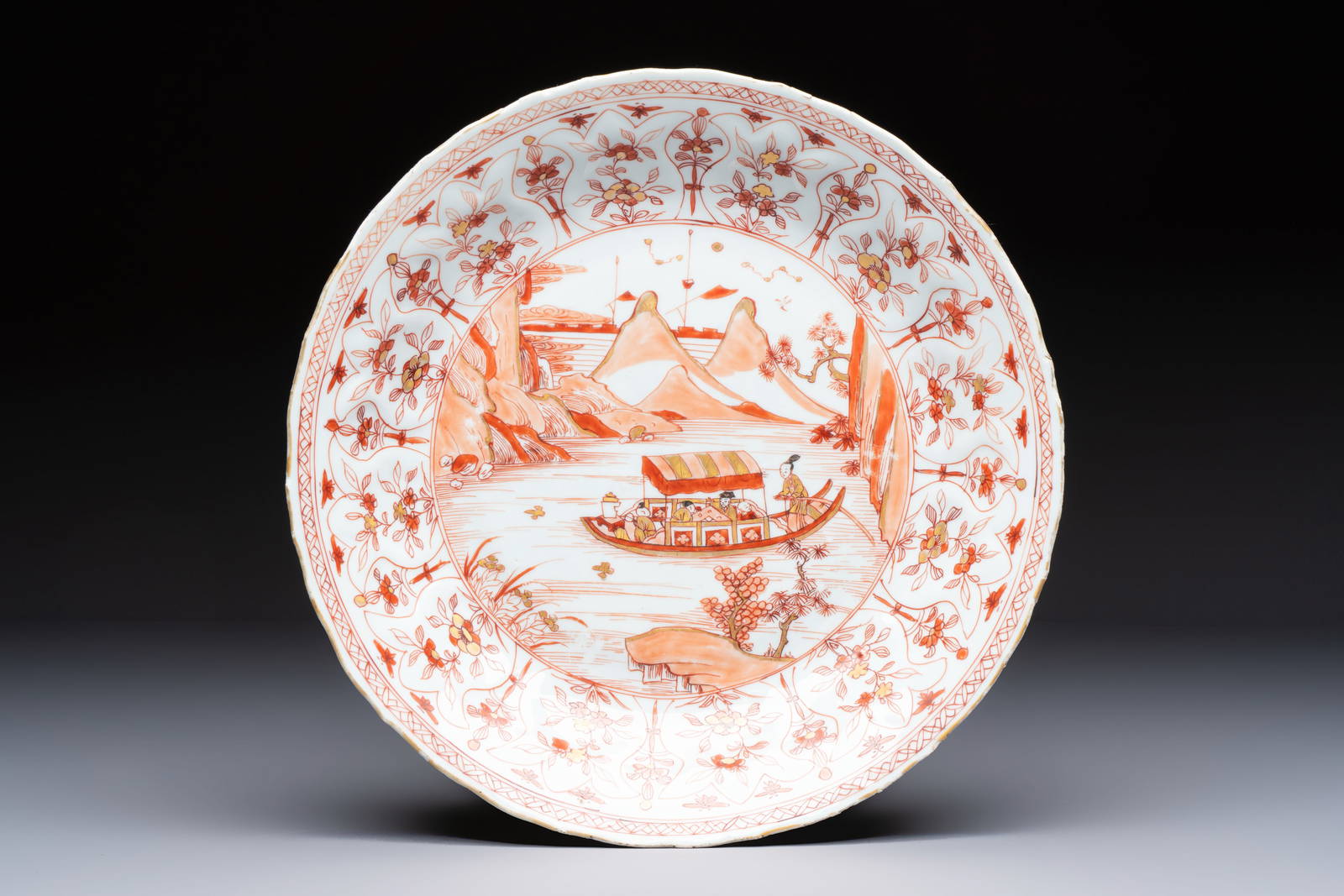 A Chinese iron-red and gilt-decorated 'Ode to the Red Cliff' dish, Kangxi