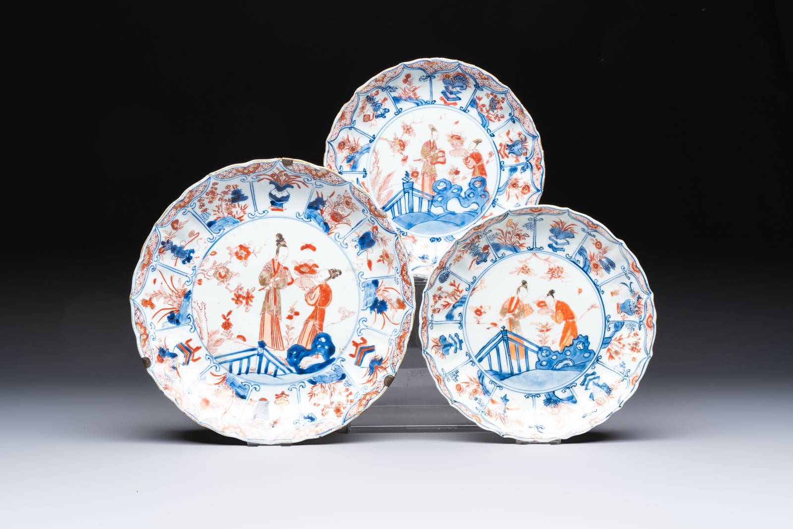Two Chinese Imari-style plates and a dish with figural design, Kangxi