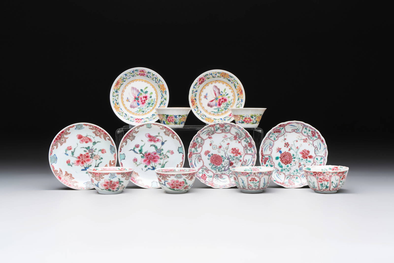 Six sets of Chinese famille rose cups and saucers, Yongzheng/Qianlong