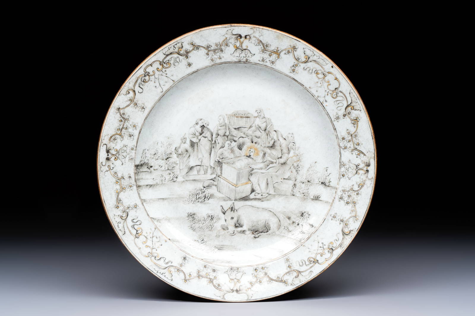 A Chinese grisaille and gilt-decorated 'Nativity' plate, Qianlong