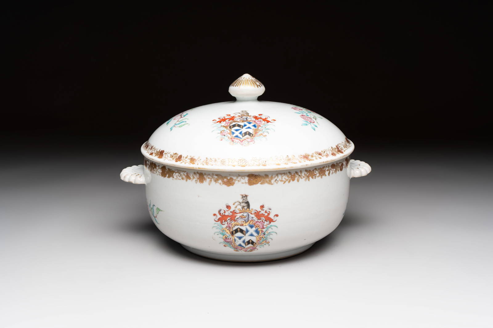 A Chinese famille rose armorial tureen and cover with the arms of Backwell quartering Tyringham for
