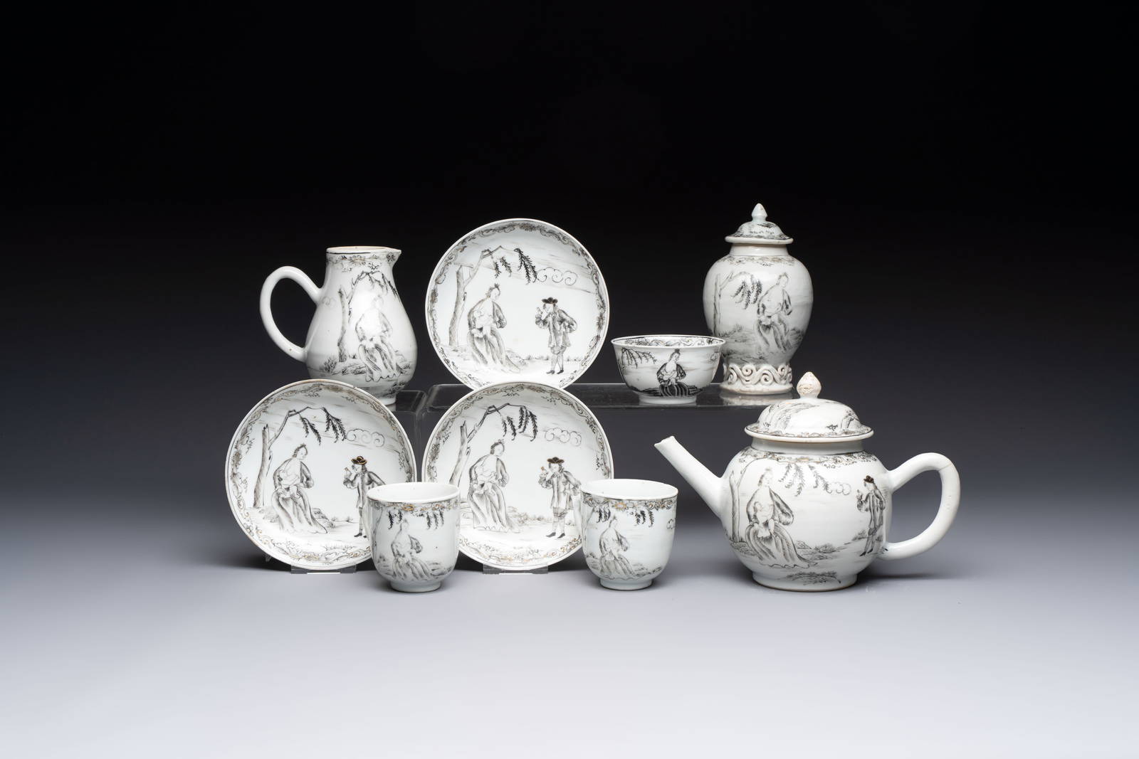A Chinese grisaille semi-erotic 'La Nourriture' nine-piece tea service, Qianlong