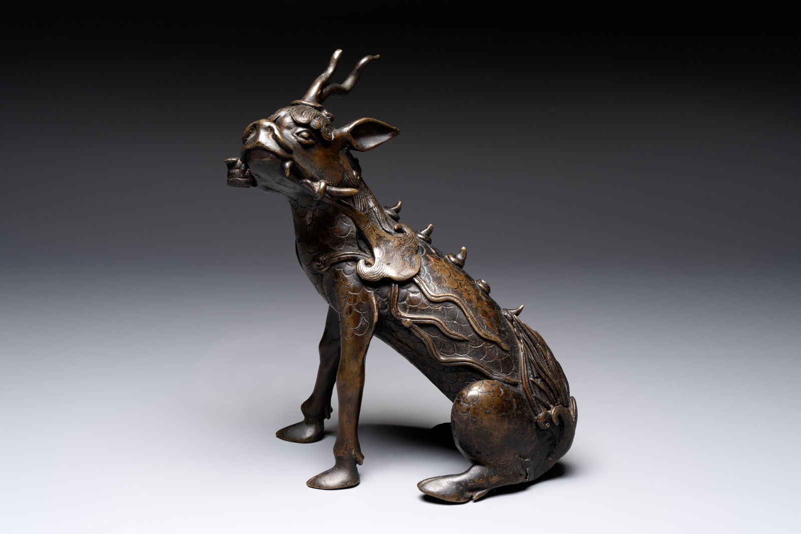 A fine Chinese bronze incense holder in the form of a qilin, Ming (1 of 12)