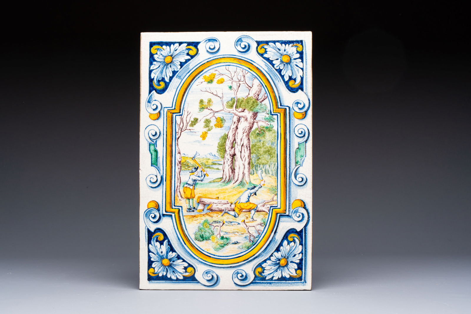 A polychrome Winterthur faience stovetop tile with a pastoral scene, Switzerland, 17th C.: A polychrome Winterthur faience stovetop tile with a pastoral scene, Switzerland, 17th C. Dim.: 29 x 43,6 x 1,7 cm