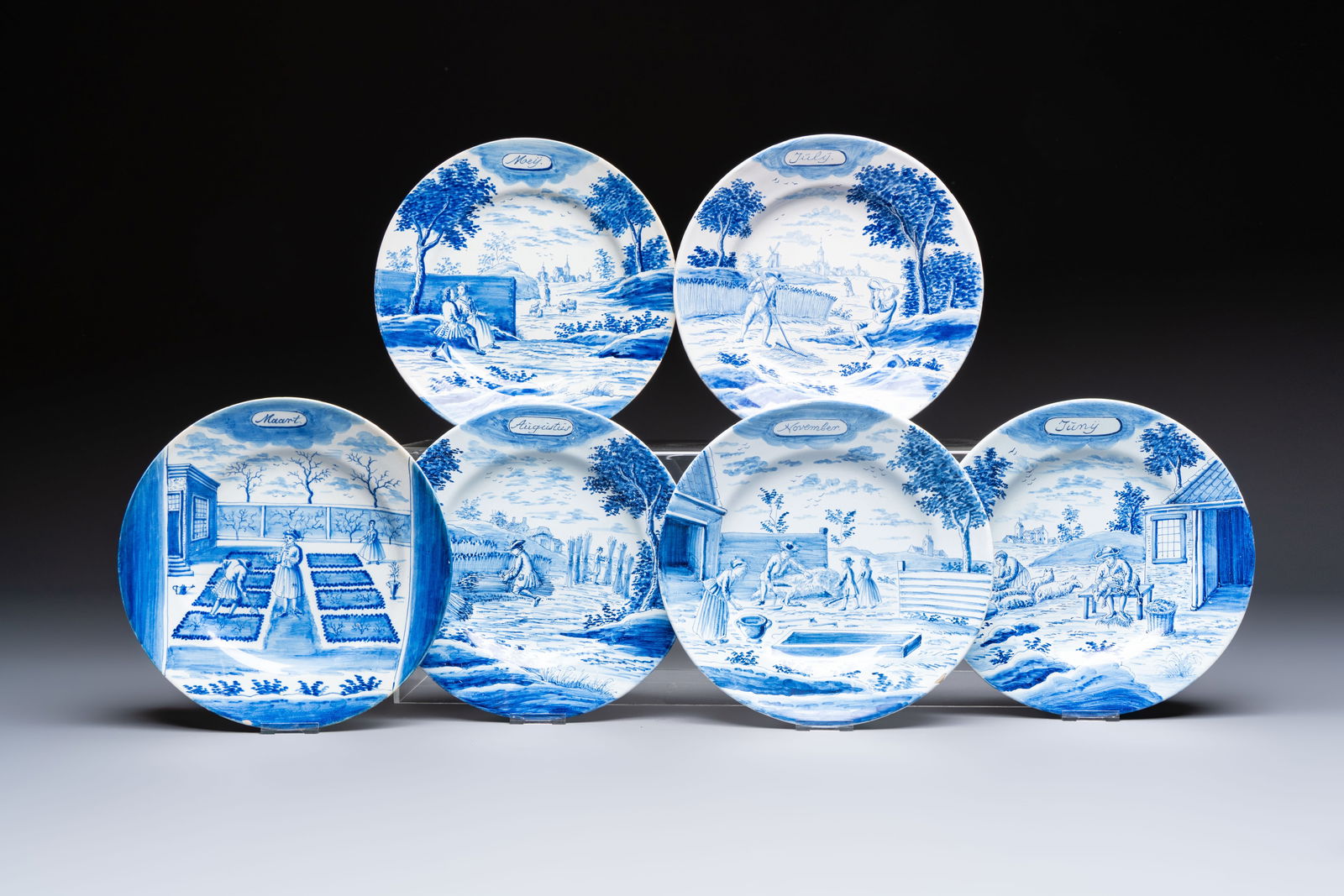 Six blue and white Dutch Delft 'Month' plates, Makkum, 19th C.: Six blue and white Dutch Delft 'Month' plates, Makkum, 19th C. Dia.: 24 cm (the largest) Dia.: 23,2 cm (the smallest)