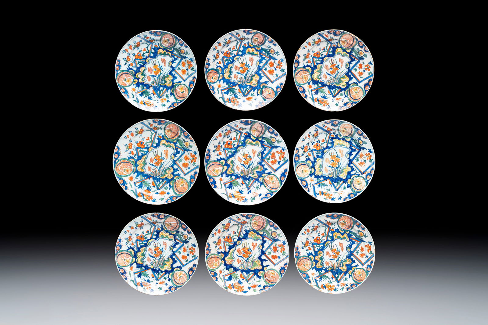 Nine polychrome Dutch Delft 'Lightning' plates, 17/18th C.: Nine polychrome Dutch Delft 'Lightning' plates, 17/18th C. Dia.: 23 cm