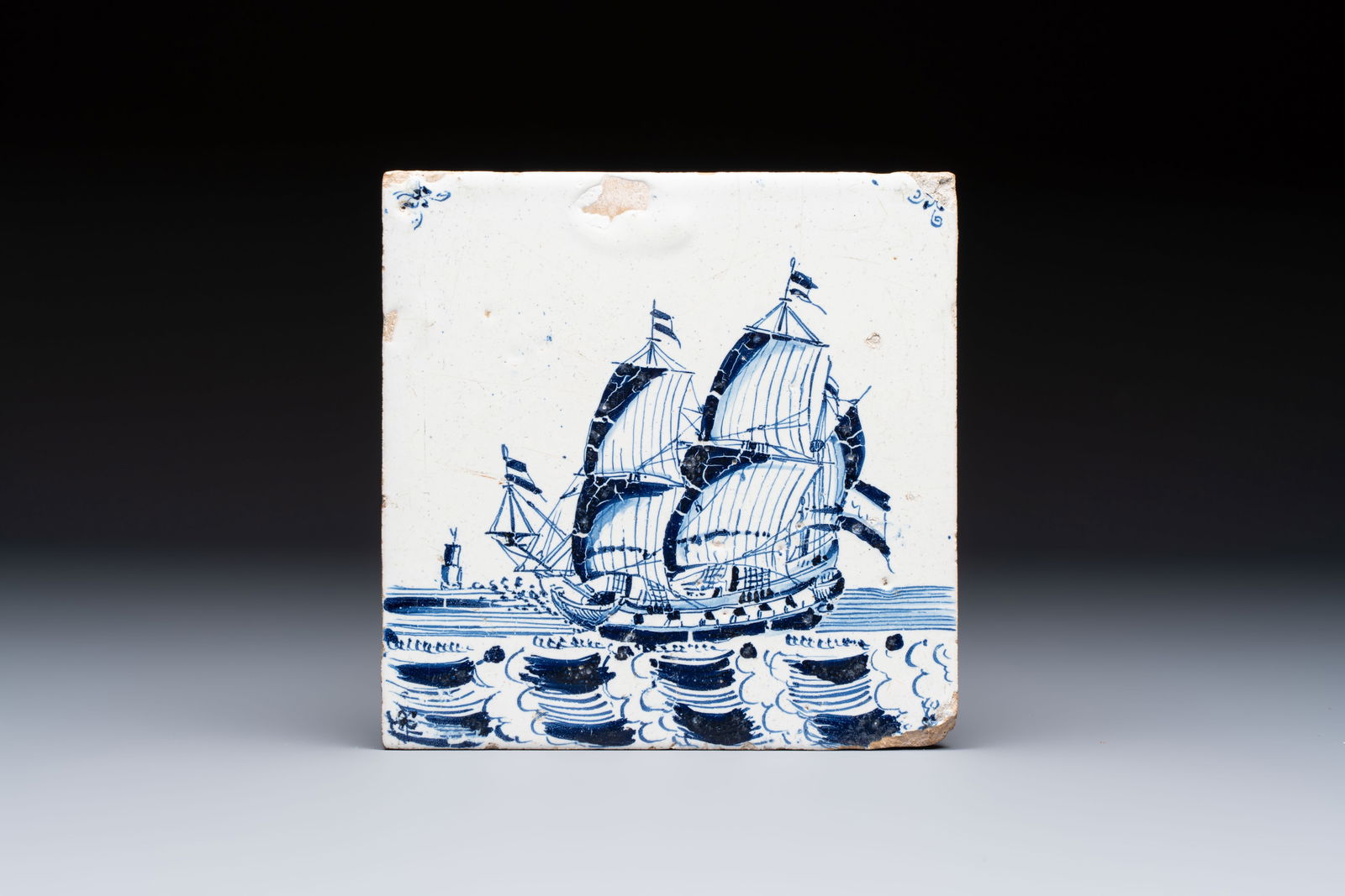 A large blue and white Dutch Delft 'Ship' tile, 17th C.: A large blue and white Dutch Delft 'Ship' tile, 17th C. Dim.: 14,7 x 14,8 x 1,2 cm