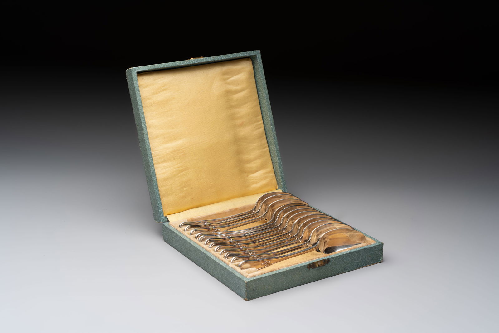 A set of 12 silver teaspoons, 800/000, 20th C. (1 of 4)