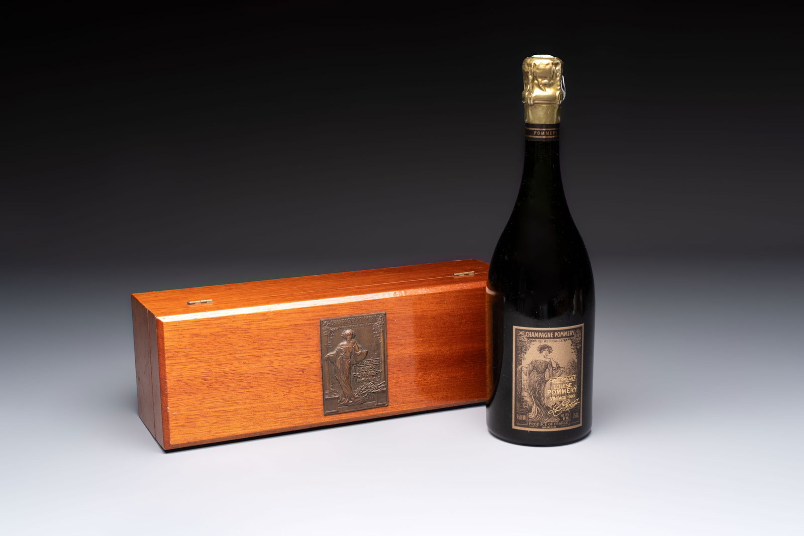 A bottle of Cuvee Speciale Louise Pommery Vintage 1980 Champagne, presented in a commemorative box (1 of 10)