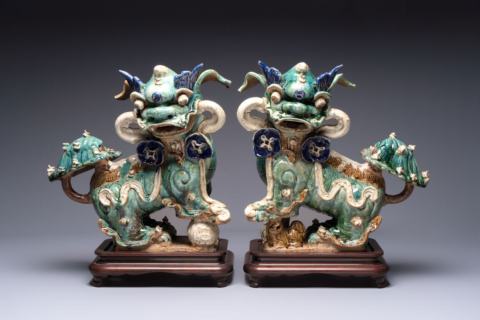 A pair of large Chinese polychrome-glazed Shiwan stoneware Buddhist lions, 19th C. (1 of 7)