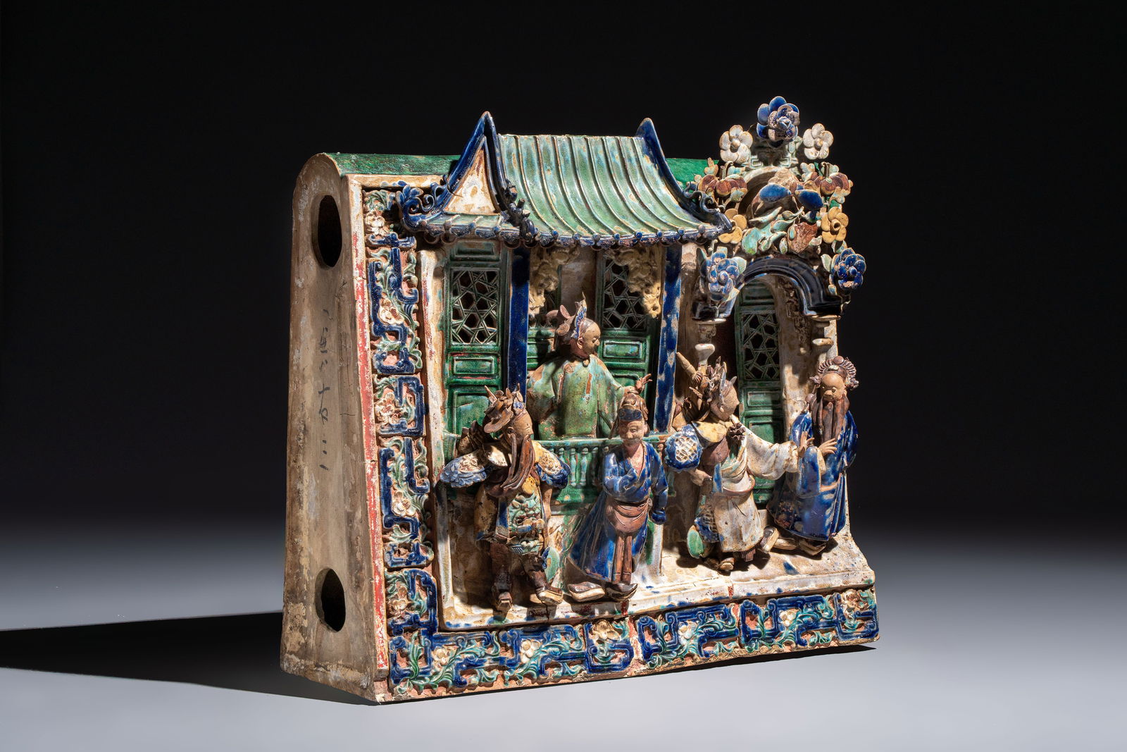 A large and fine Chinese polychrome-glazed Shiwan stoneware group of immortals, 19th C. (1 of 7)