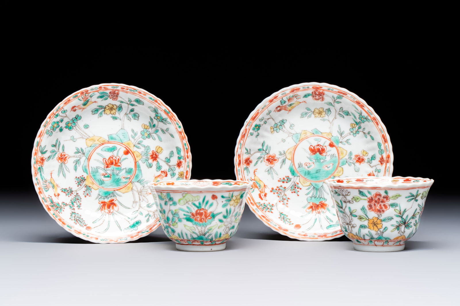A pair of Chinese famille verte cups and saucers with floral design, Jade marks, 19th C. (1 of 9)