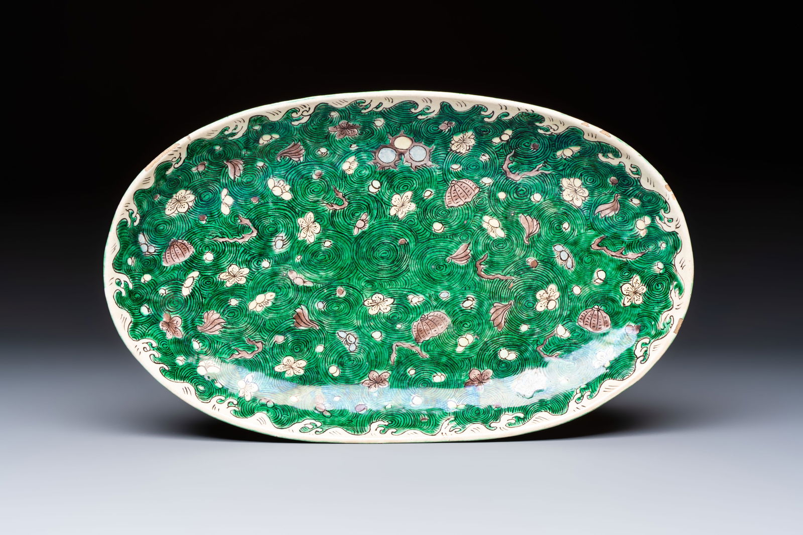 A Chinese verte biscuit oval dish, 19/20th C. (1 of 3)