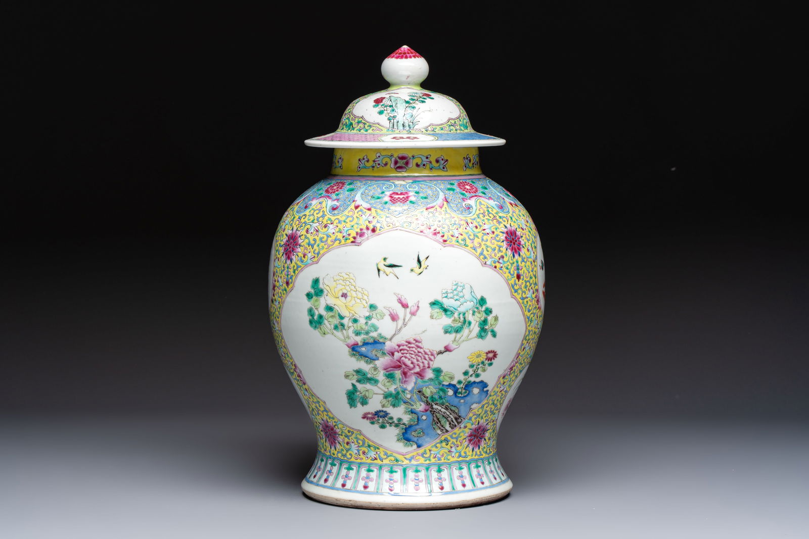 A Chinese famille rose vase and cover with birds among flowering branches, 19th C.: A Chinese famille rose vase and cover with birds among flowering branches, 19th C. H.: 42,3 cm (incl. cover)